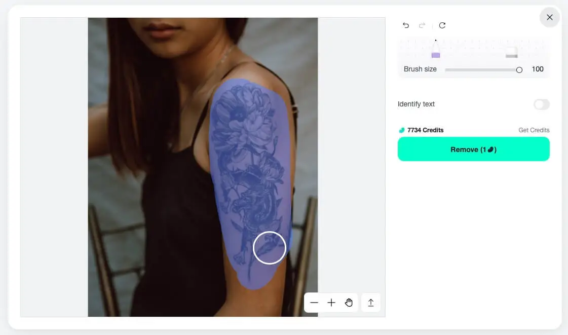 Brush over your tattoo clearly to guide accurate AI removal processing.