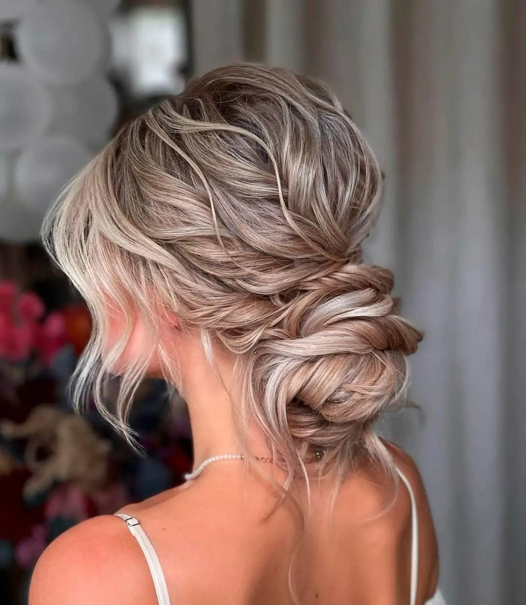 prom hairstyles: modern textured low bun hairstyle 